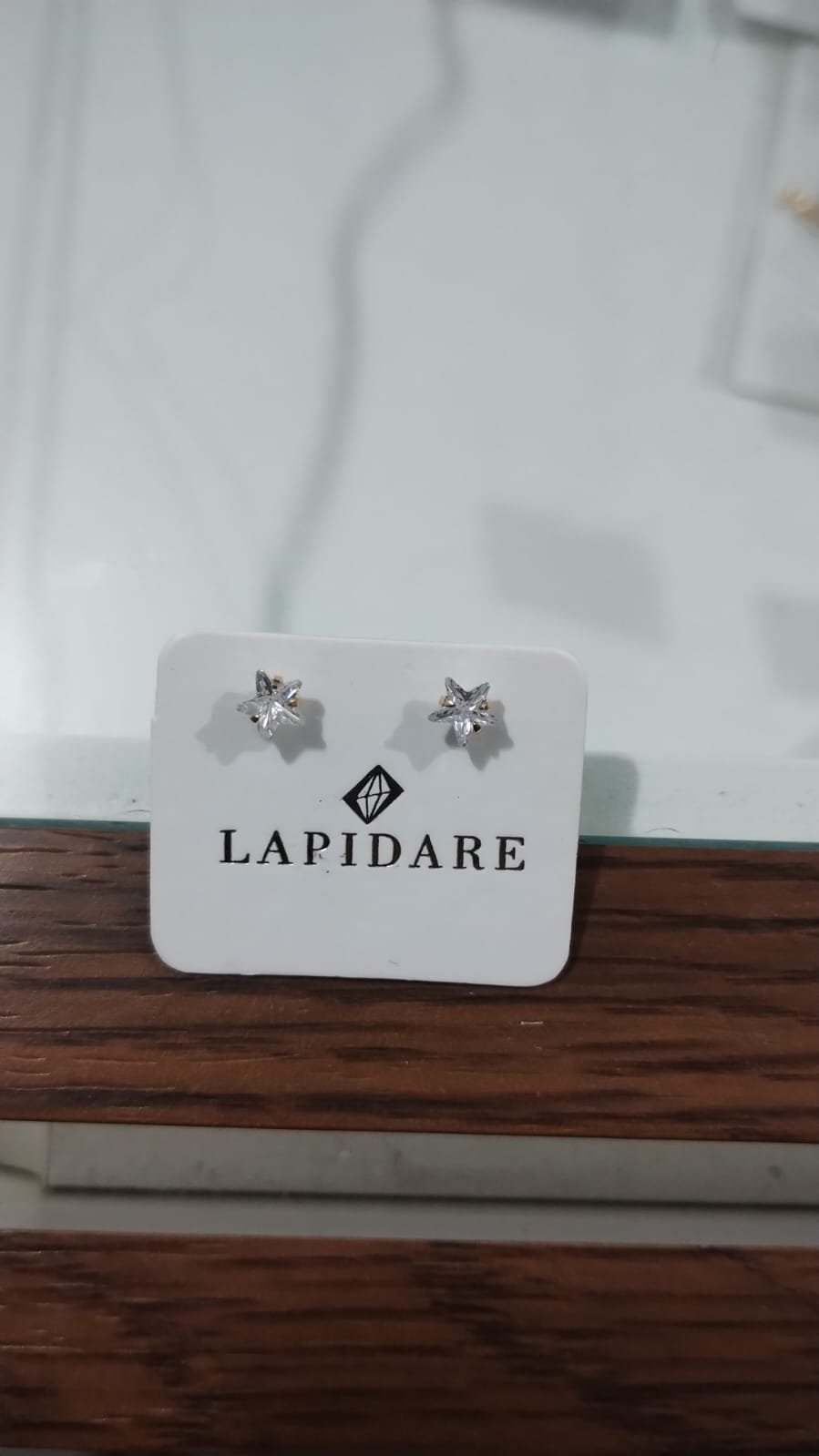 Brinco estrela com pedras Lapidare